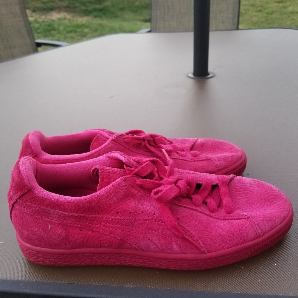 Hot pink suede Puma sneakers